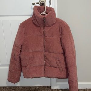 Cute pink coat size Large never worn the tag came off